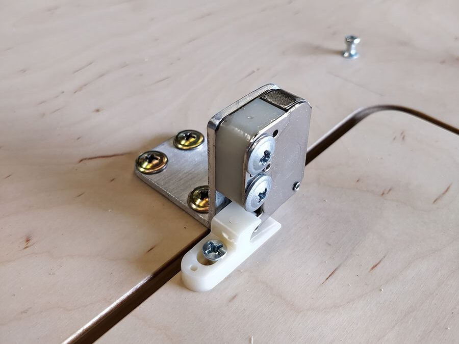 Bed head storage latches on angle brackets